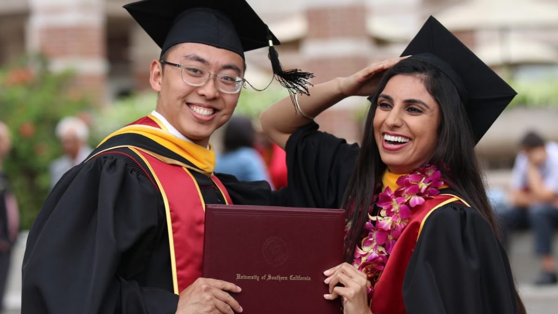 Happy graduates celebrating their achievement at University of Southern California.